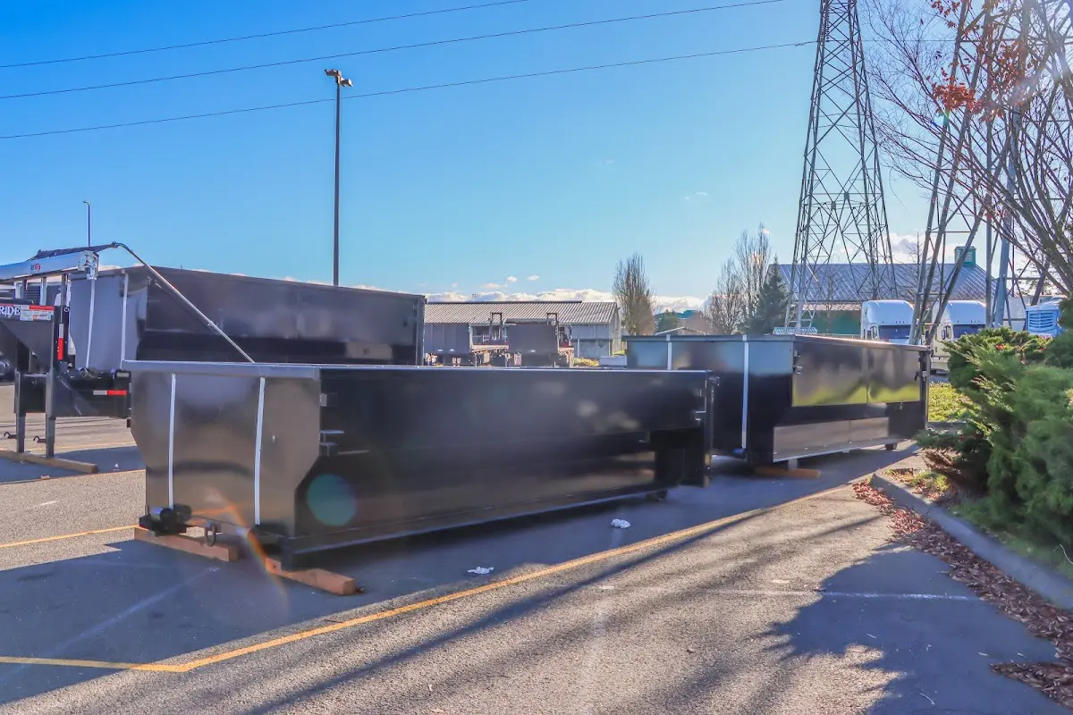 Roll-off dumpster ready for waste disposal at job site for 2 Yard Dumpster Rental in San Leandro